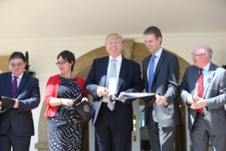 Donald and Eric Trump cut the ribbon at the official opening
