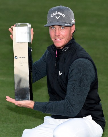 SHANGHAI, CHINA - NOVEMBER 15: Kristoffer Broberg of Sweden with the winners trophy after the final round of the BMW Masters at Lake Malaren Golf Club on November 15, 2015 in Shanghai, China. (Photo by Ross Kinnaird/Getty Images)