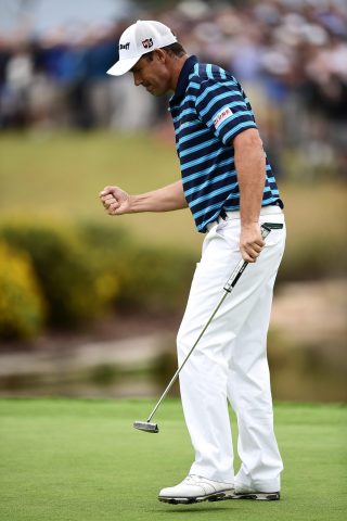 Harrington celebrates holing out at 18 for his first European Tour title since 2008