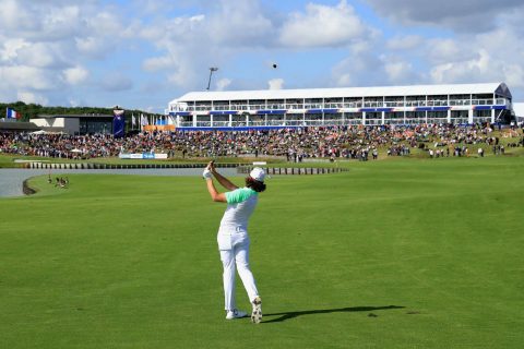 Fleetwood fires his approach to the 18th green en route to a one-shot victory in the French Open