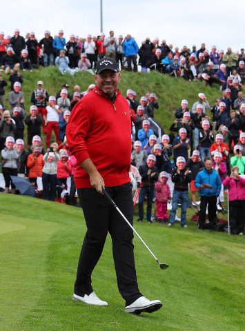 AALBORG, DENMARK - AUGUST 24:  Thomas Bjorn of Denmark on the 16th green as spectators wear masks to celebrate his 500th European Tour appearance during day one of Made in Denmark at Himmerland Golf & Spa Resort on August 24, 2017 in Aalborg, Denmark.  (Photo by Warren Little/Getty Images)