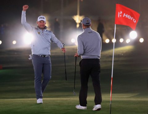 Lee Westwood celebrates winning the Hero Challenge after beating Sergio Garcia in the final