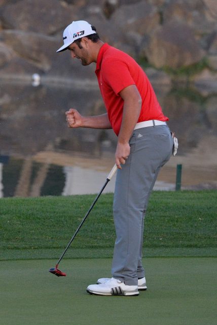 Jon Rahm celebrates after holing a putt to win the playoff at the CareerBuilder Challenge