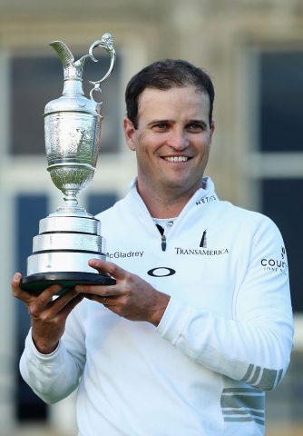 ST ANDREWS, SCOTLAND - JULY 20: Zach Johnson of the United States holds the Claret Jug after winning the 144th Open Championship at The Old Course during a 4-hole playoff on July 20, 2015 in St Andrews, Scotland. (Photo by Andrew Redington/Getty Images)