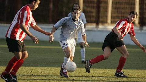 On the ball: Sergio Garcia turned out for his home town's football team, Borriol, earlier in his career 