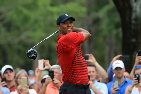 Tiger Woods continued his improved form with a tied second finish
