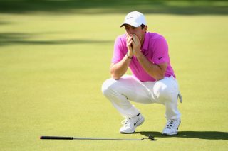 Close but no cigar: McIlroy missed eagle putt on the 18th green by an inch but ultimately came up two shots short after a lacklustre weekend's play