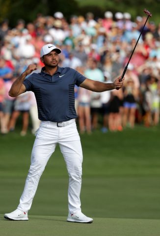 CHARLOTTE, NC - MAY 06: Jason Day of Australia reacts following his par putt on the 18th green during the final round to win the 2018 Wells Fargo Championship at Quail Hollow Club on May 6, 2018 in Charlotte, North Carolina. (Photo by Streeter Lecka/Getty Images)