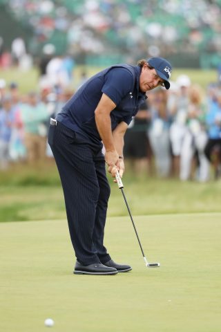 Phil Mickelson caused controversy during the third round when deliberately hitting a moving a ball on the green