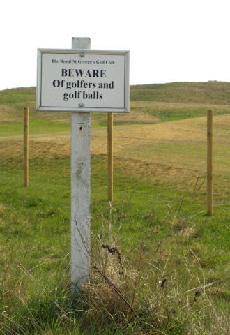 Golf clubs are required to put up signs to warn golfers and those walking close to golf courses about the potential hazards from flying golf balls
