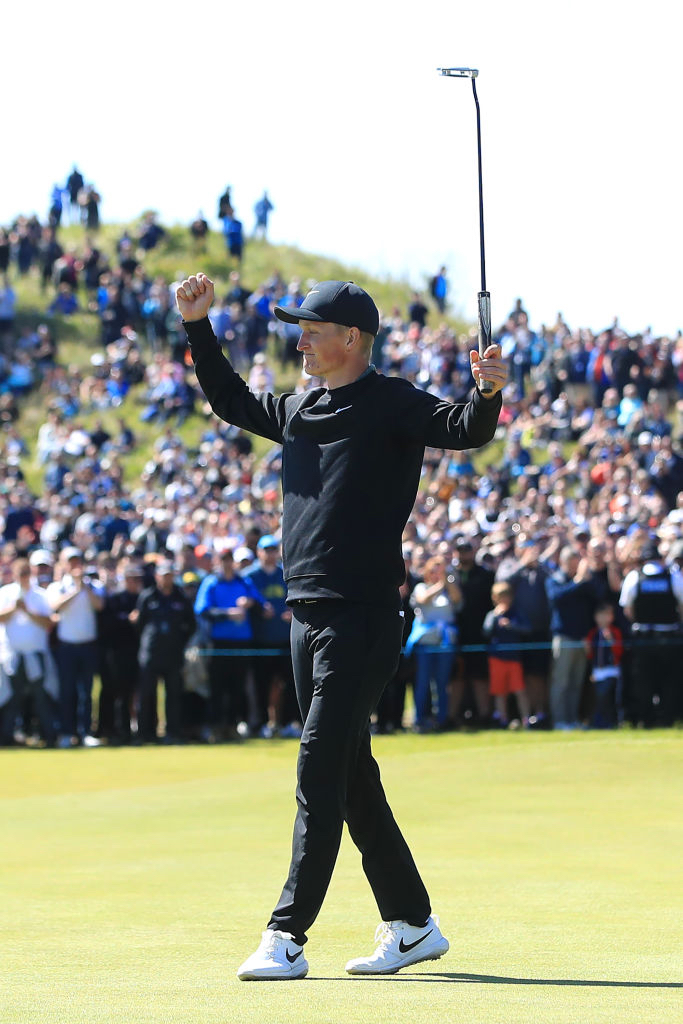 Marcus Kinhult celebrates after holing a putt for victory on the 18th green at the Betfred British Masters at Hillside
